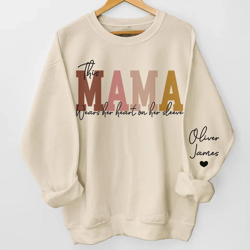This Mama Wears Her Heart On Her Sleeve - Family Personalized Custom Unisex Sweatshirt, Hoodie With Design On Sleeve - Christmas Gift For Mom, Grandma