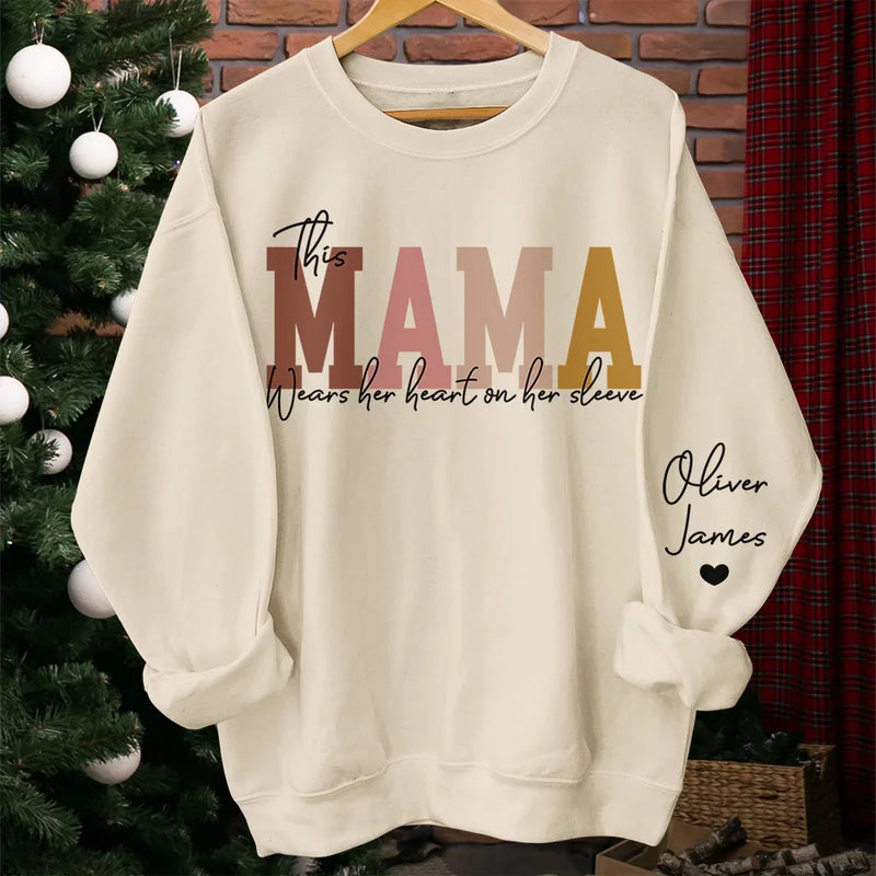 This Mama Wears Her Heart On Her Sleeve - Family Personalized Custom Unisex Sweatshirt, Hoodie With Design On Sleeve - Christmas Gift For Mom, Grandma