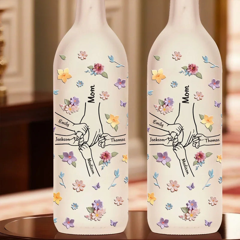 A Mother’s Hands Cradle The World While Filling It With Love - Family Personalized Custom Bottle Lamp - Gift For Mom, Grandma