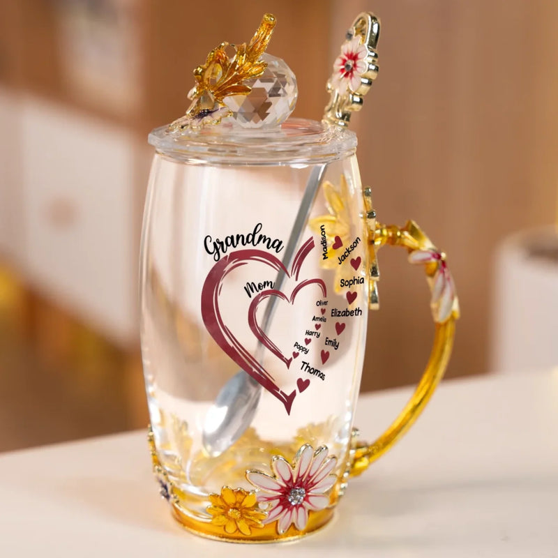 Grandma’s Heart Overflows With Love - Family Personalized Custom Enamel Flower Tea Cup With Lid & Spoon - Mother's Day, Gift For Mom, Grandma