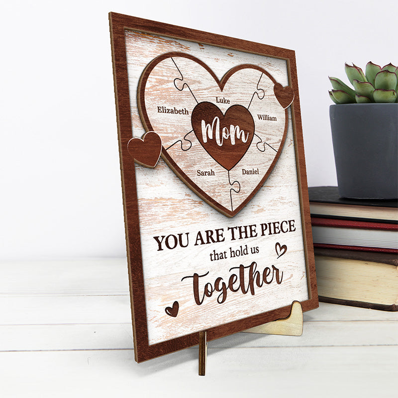 You Are The Piece That Holds Us Together - Family Personalized Custom 2-Layered Wooden Plaque With Stand - House Warming Gift For Mom, Grandma